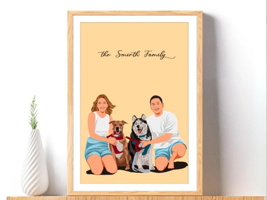 an illustrated picture of a man and woman and their 2 dogs in a frame on a shelf