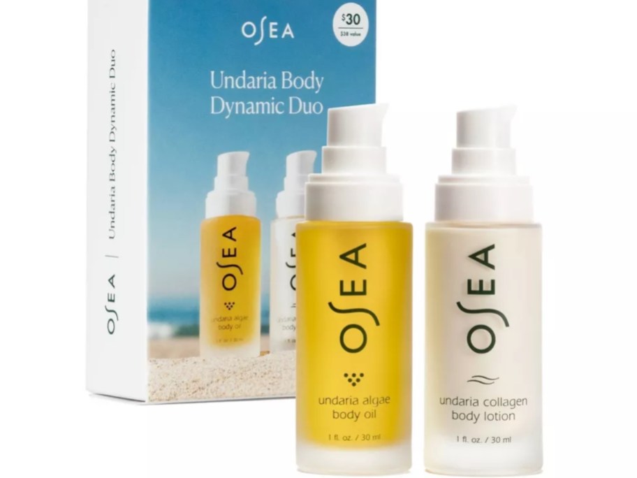 an OSEA body care gift set with a bottle of body oil and a bottle of lotion next to the box the set comes in