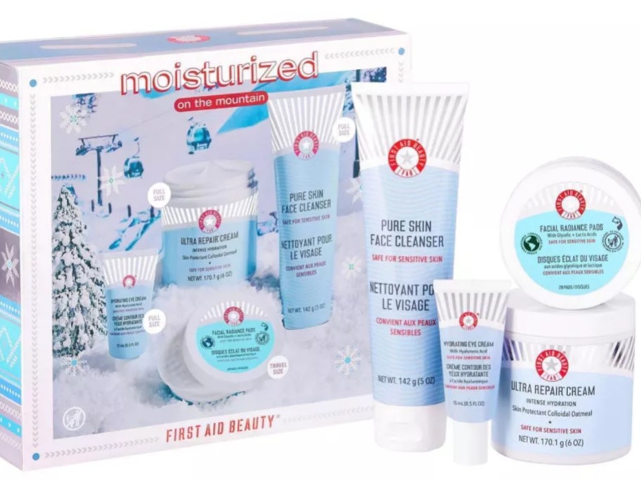 a First Aid Beauty skincare gift set with various tubes of skincare items next to the box they come in