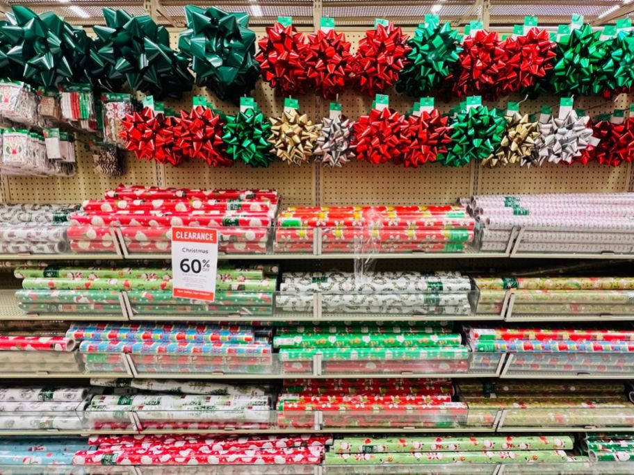 gift wrap rolls and bows on a store aisle 