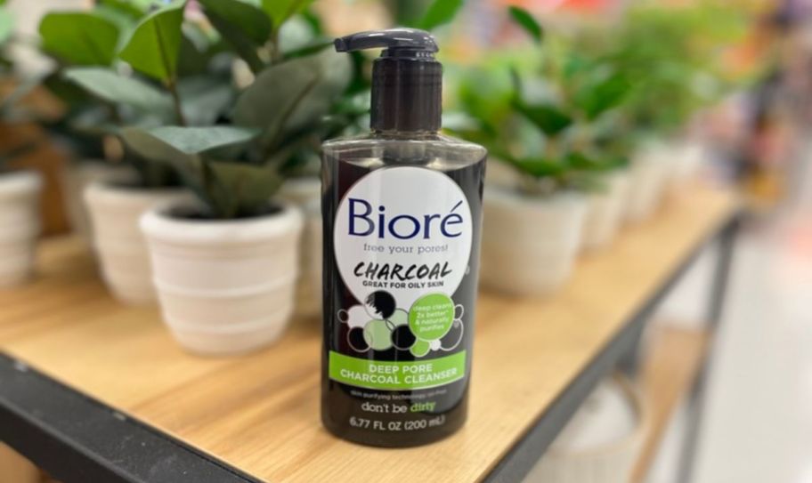 a bottle of biore charcoal cleanser