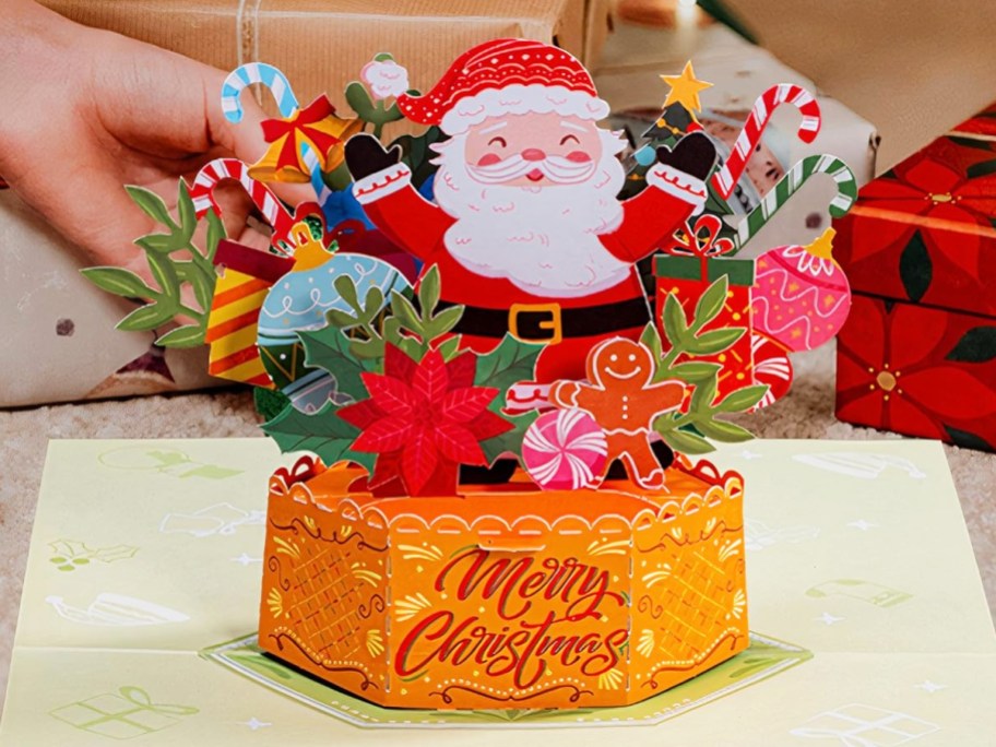 santa pop-up card that says merry christmas