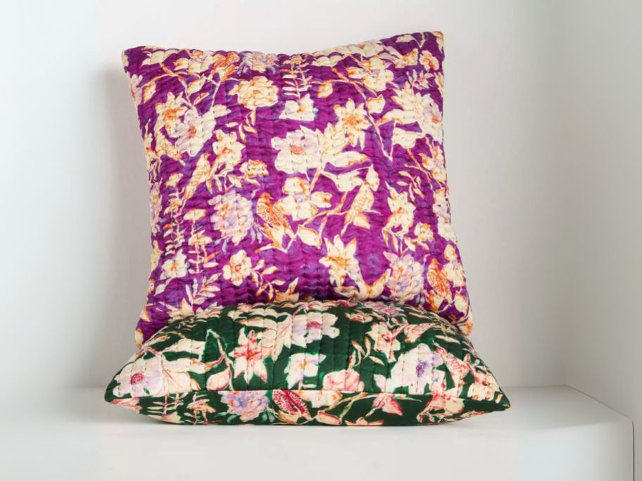 Anthropologie Delilah Silky Pillows against wall