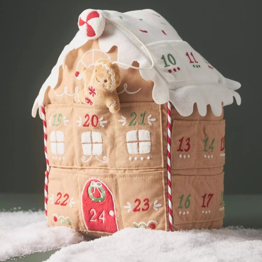 a large plush Gingerbread house Christmas Advent calendar