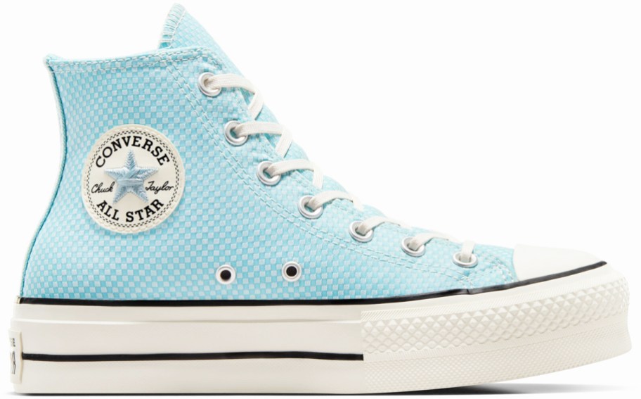 blue checkered high top converse shoe