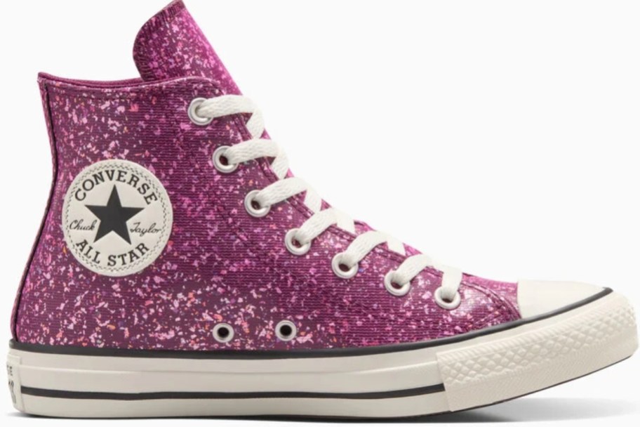 a converse Chuck Taylor women's high top shoe in pink glitter