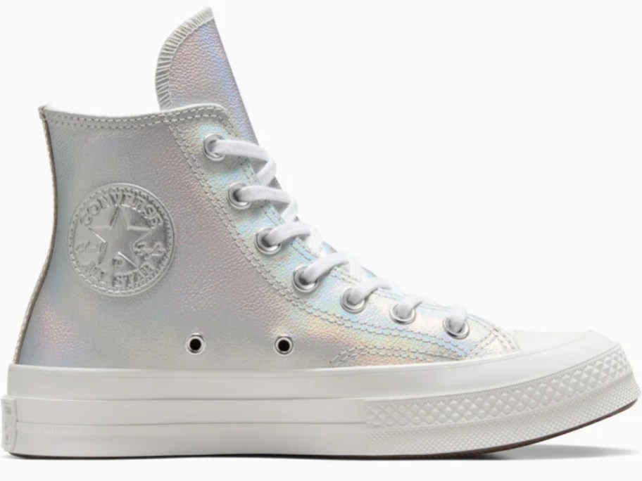 a Converse Chuck Taylor high top shoe in an iridescent silver chrome color