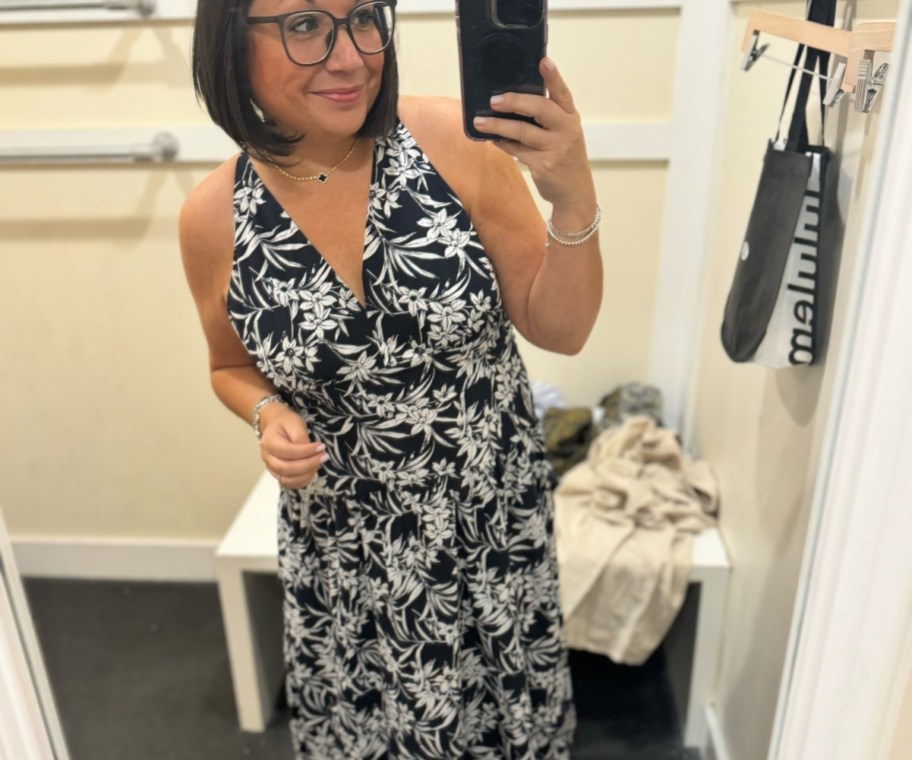 woman wearing floral madewell dress in store