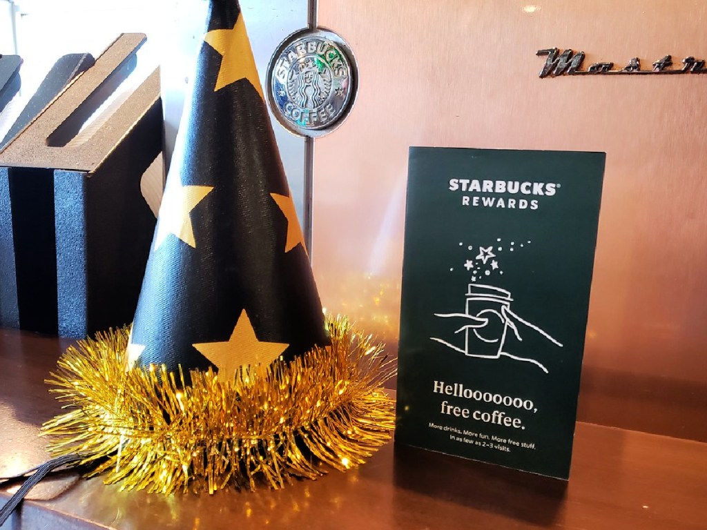 starbucks rewards informational flyer and birthday hat