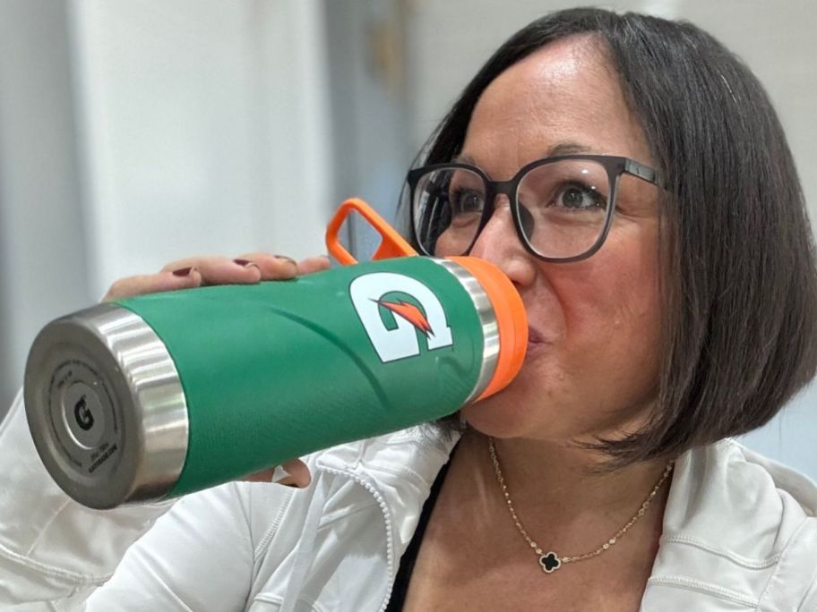 Woman drinking from a Gatorade Stainless STeel Water Bottle