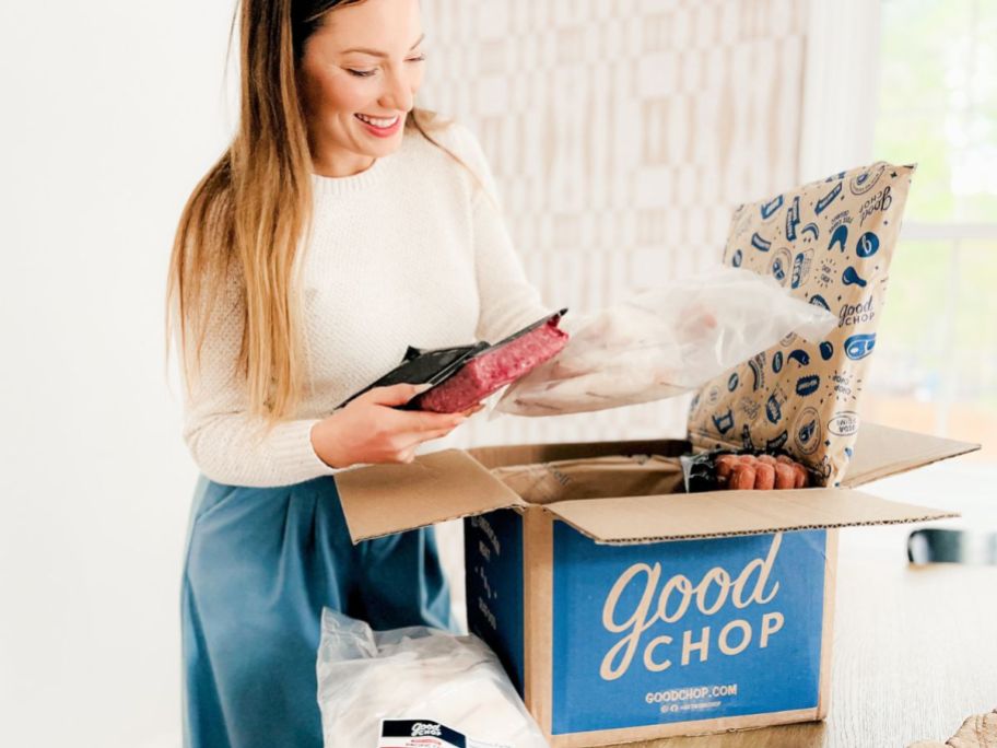 Woman unpacking a Good Chop box