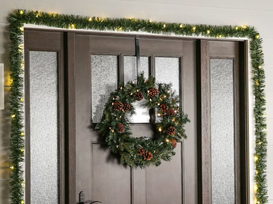 A door with garland and a wreath