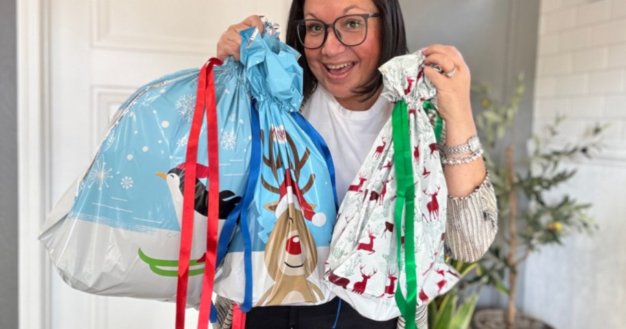 woman holding christmas bag set