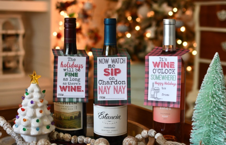 christmas wine bottle gift tags on various wine bottles