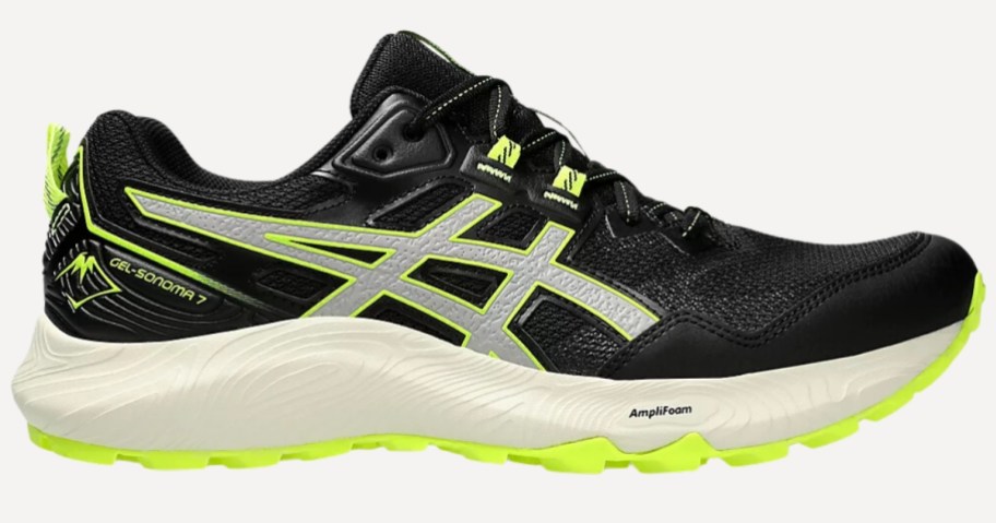 a men's Asics running shoe in black with yellow and white accents