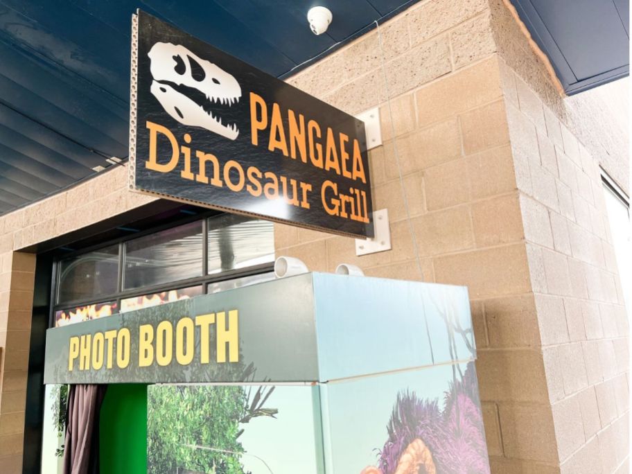 Pangaea Dinosaur Grill Sign above Photo Booth