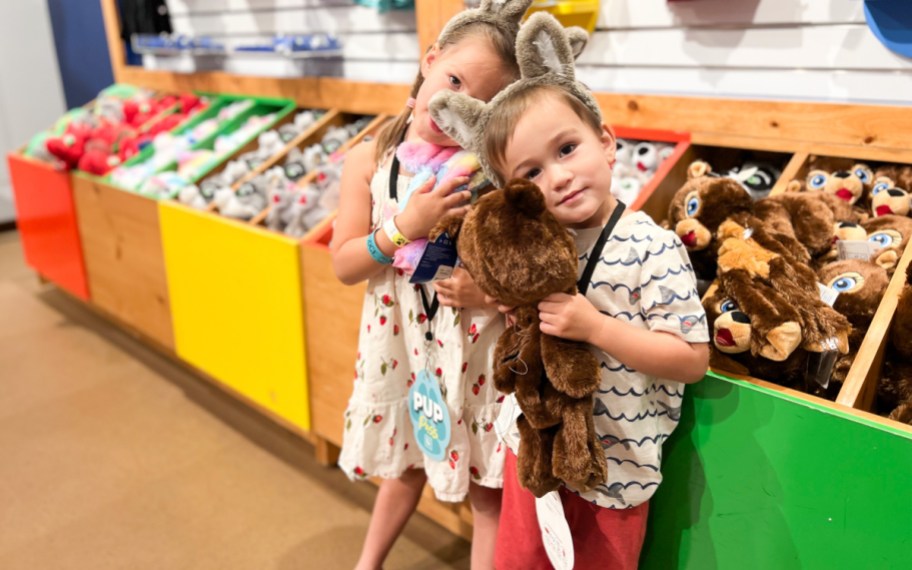 kids hugging build a bears