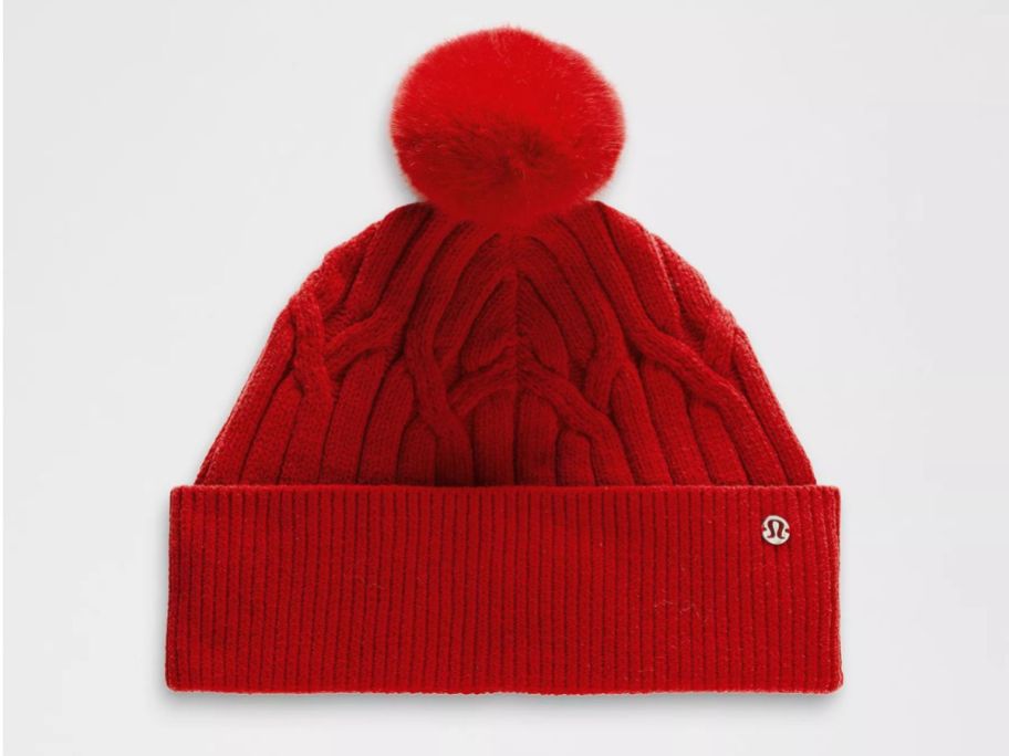 lululemon Women's Cable-Knit Pom-Pom Beanie stock image