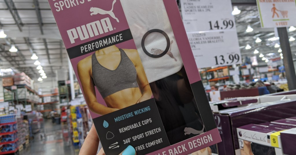 person holding puma sports bra in Costco