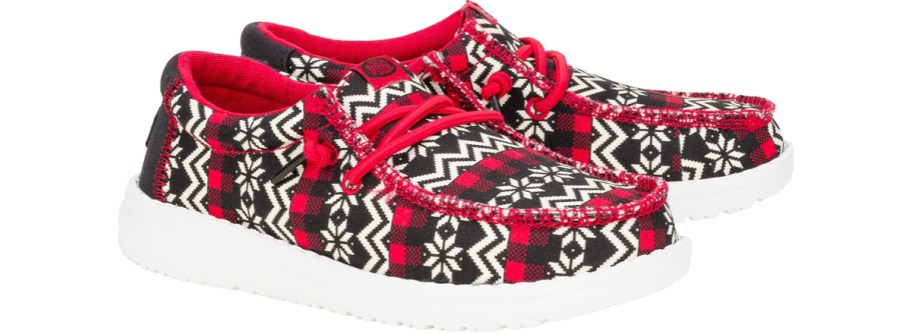 pair of black and red ugly sweater print sneakers