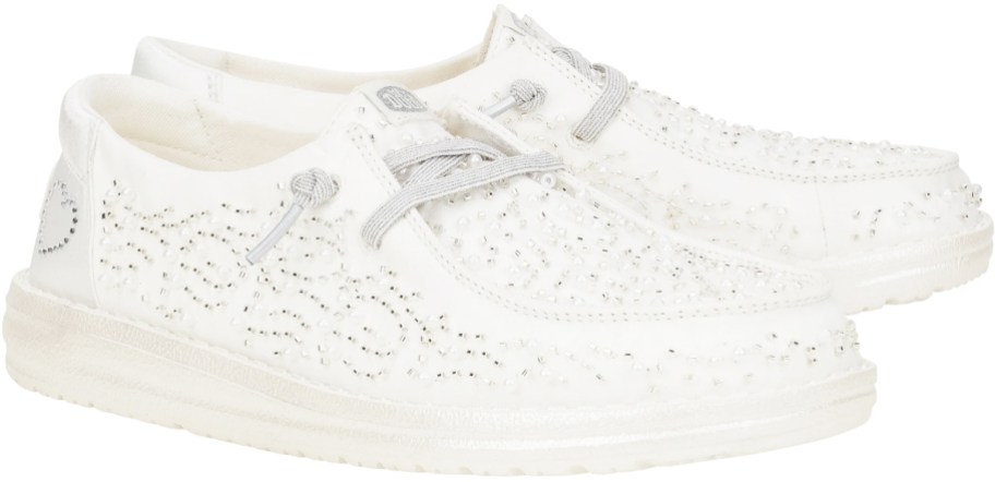 pair of white beaded sneakers