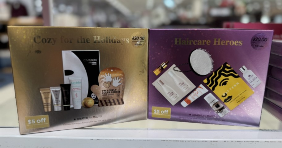 2 beauty gift sets in boxes on a store shelf