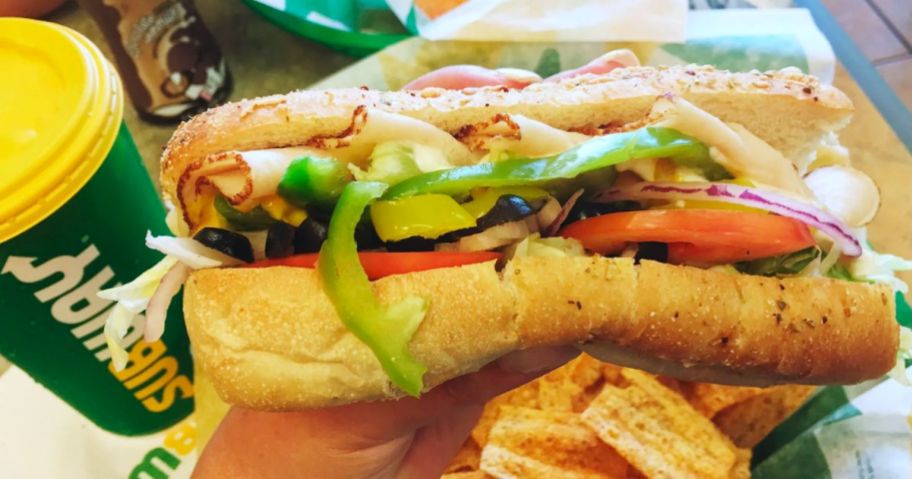 subway sandwich and fountain drink