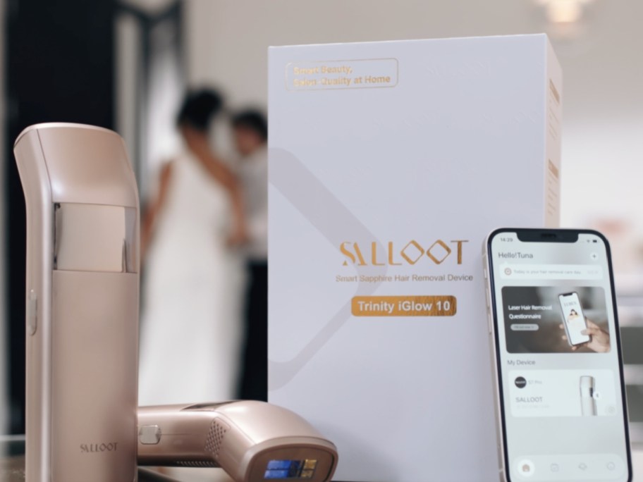 Salloot IPL Laser Hair Removal Device displayed with items on the table