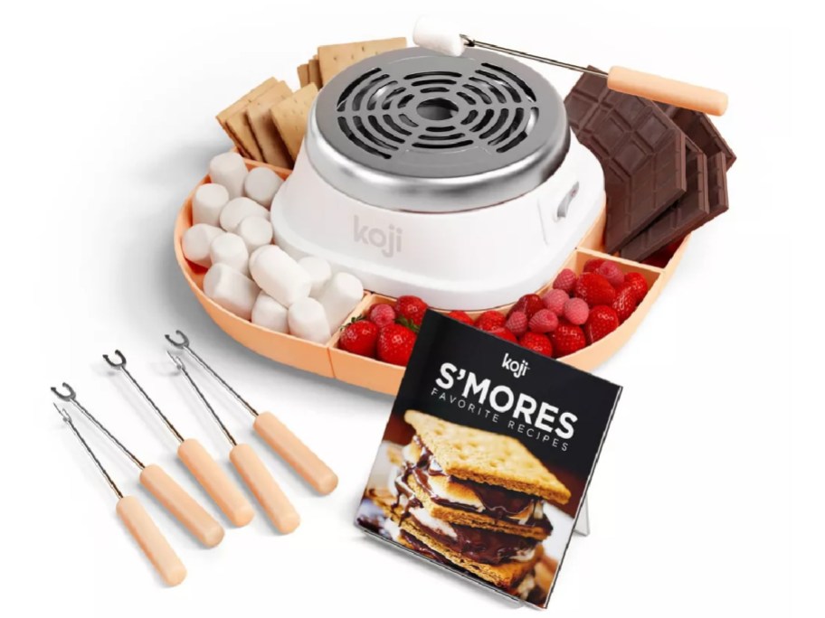 koji s'mores maker full of chocolate bars, marshmallows, graham crackers, berries, skewers, and recipe book