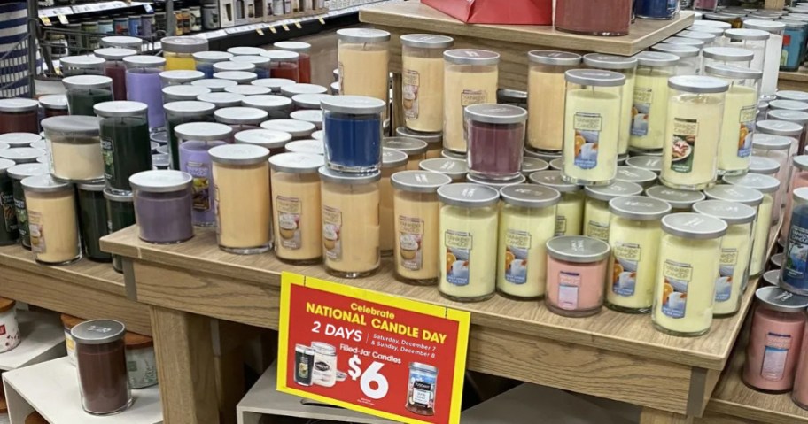 kroger candle day signage and jarred candles in store