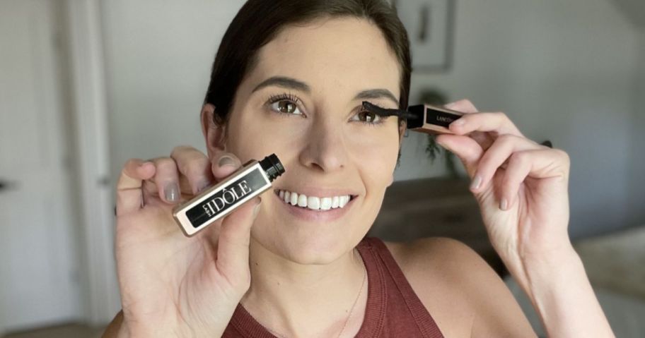 Woman applying Lancome Lash Idole Mascara