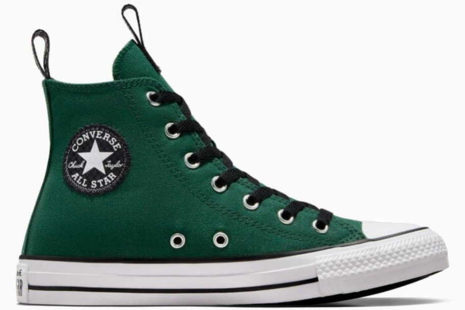 a kids high top Chuck Taylor shoe in dark green