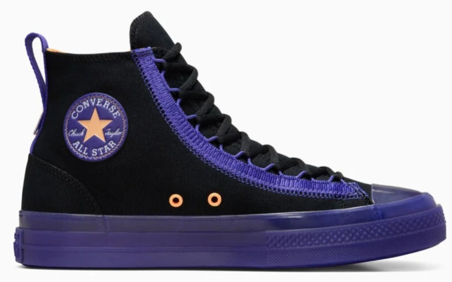 a Converse Chuck Taylor adults shoe in black with bright blue accents and soles