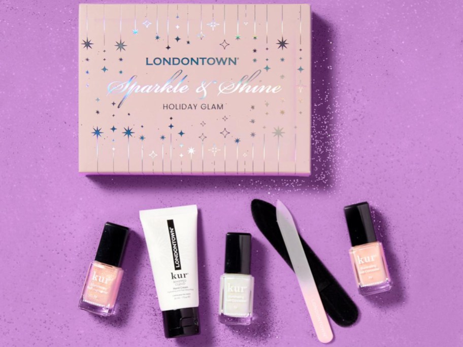 londontown box with three kur nail polish, nail file, and hand cream