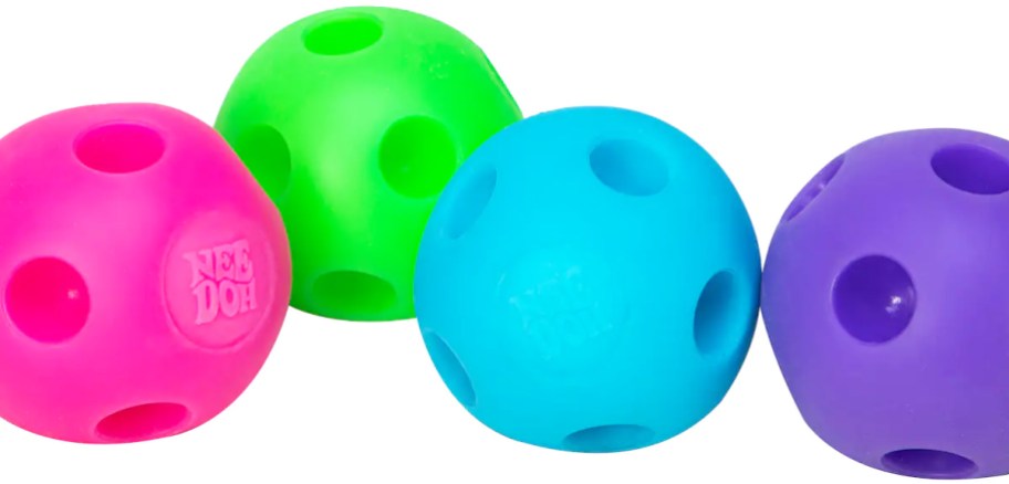 pink, purple, blue, and purple toy balls