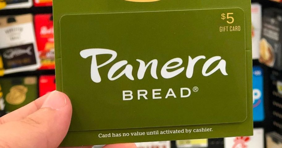 hand holding panera gift card