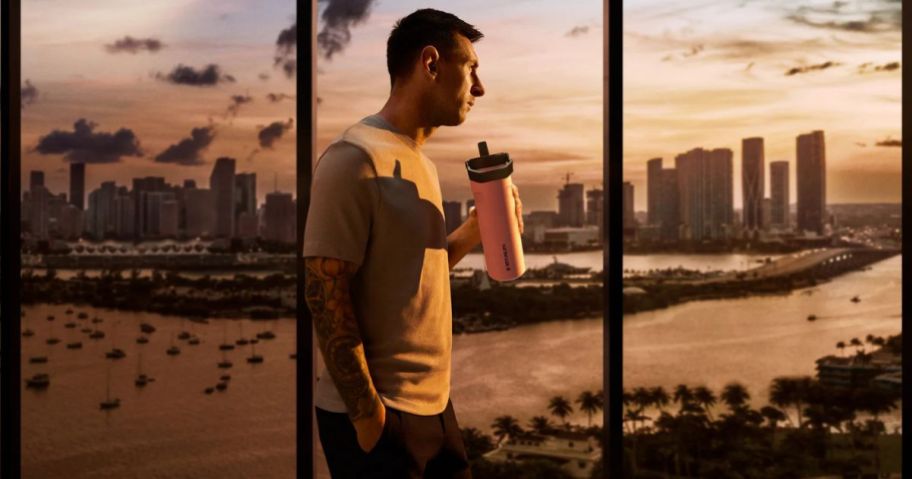 Messi drinking from a new Stanley x Messi Tumbler