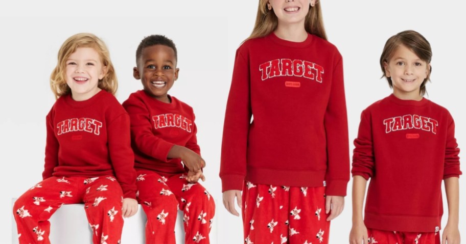 toddler girl and boy and little girl and little boy wearing matching red color sweatshirts that have "Target" spelled out in block letters - they are Target store branded sweatshirts 