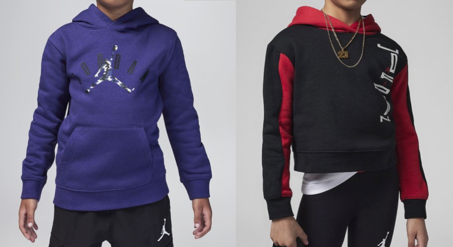 two kids in blue and black jordan hoodies