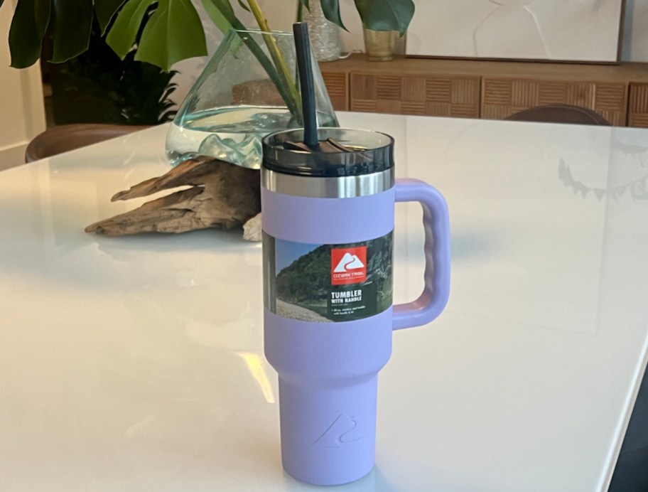 purple ozark trail tumbler on white kitchen counter