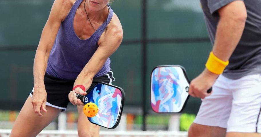 two people playing pickleball with Niupipo rackets