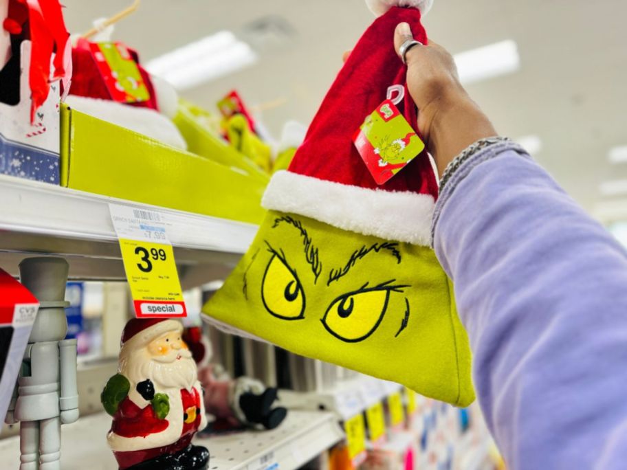 Grinch Santa Hat in hand in store