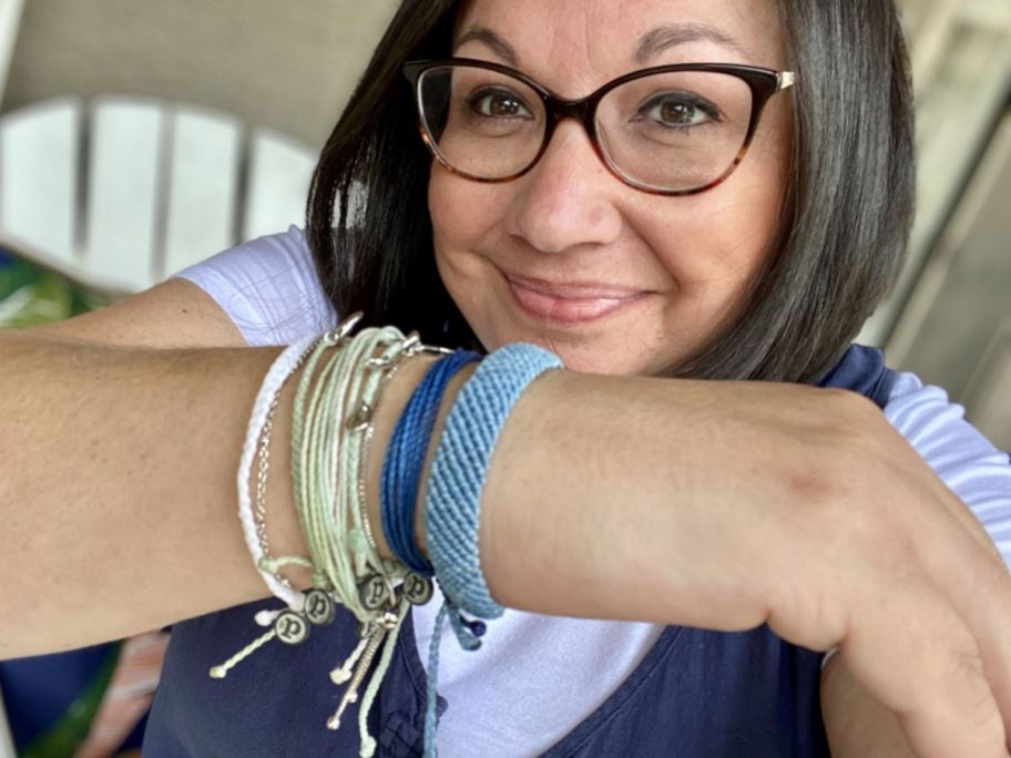 Woman wearing Pura Vida bracelets