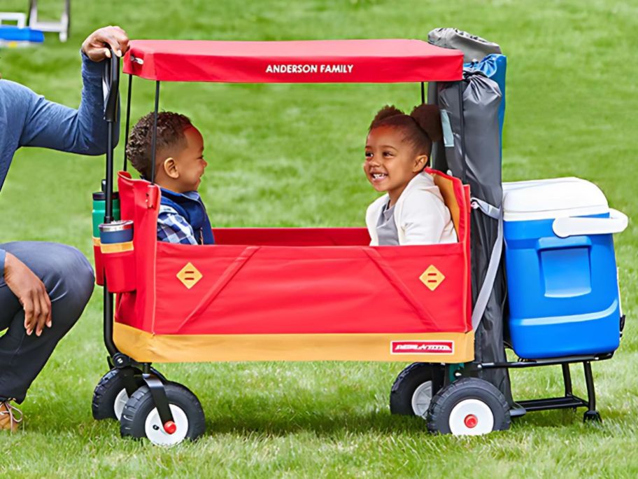 Radio Flyer Build-A-Wagon with two happy kiddos inside