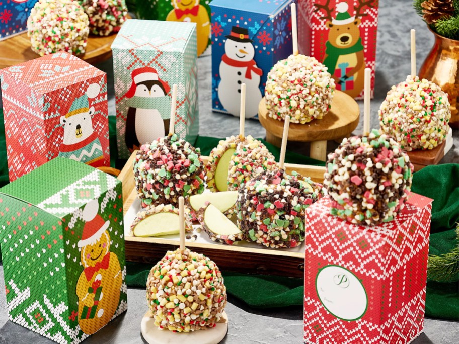 set of christmas caramel apples with gift boxes