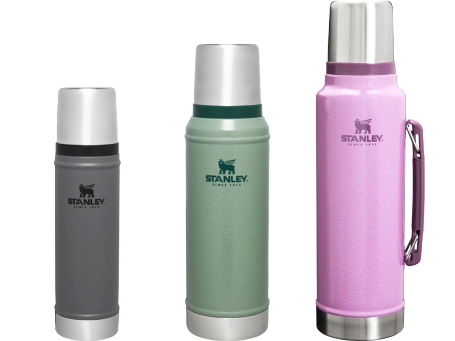 grey, green, and pink stanley bottles