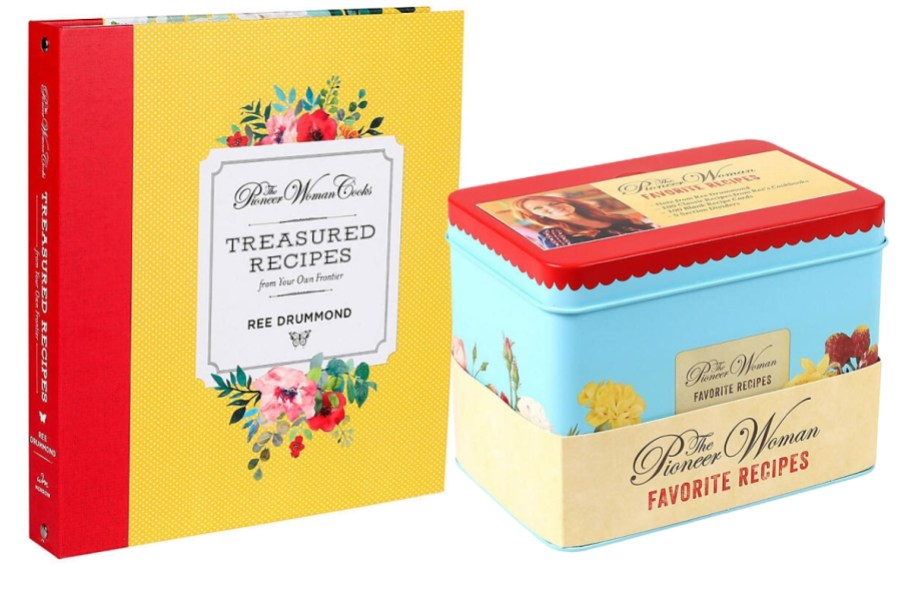 a yellow and red Pioneer Woman recipe binder and a blue and red Pioneer Woman recipe tin box