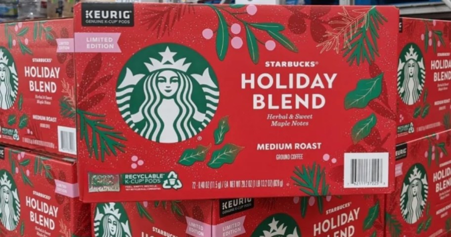 a large red and green box of Starbucks Holiday Blend Coffee K-Cups, 64-Count, with more stacked behind it