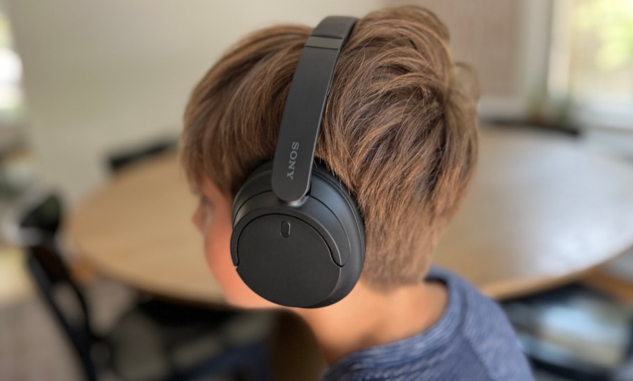 boy hearing sony headphones