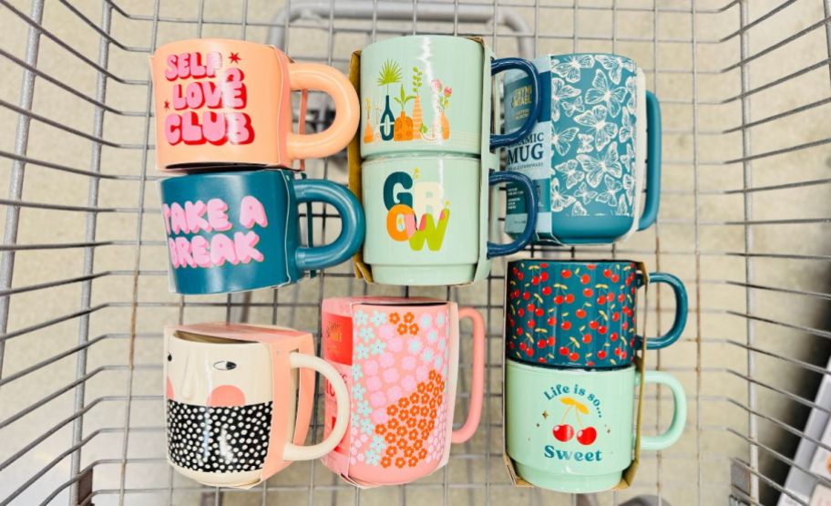 assorted mugs in a walmart shopping cart